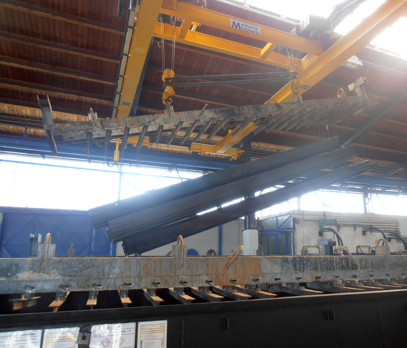 Hot dip galvanized steel angle, channel and flat bar stacked at the works