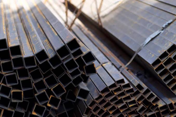 Stack of steel square hollow sections — box tube and bar